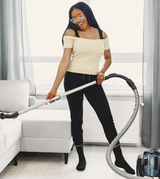 african-american-woman-using-vacuum-cleaner-at-hom-2022-02-06-08-33-58-utc.jpg